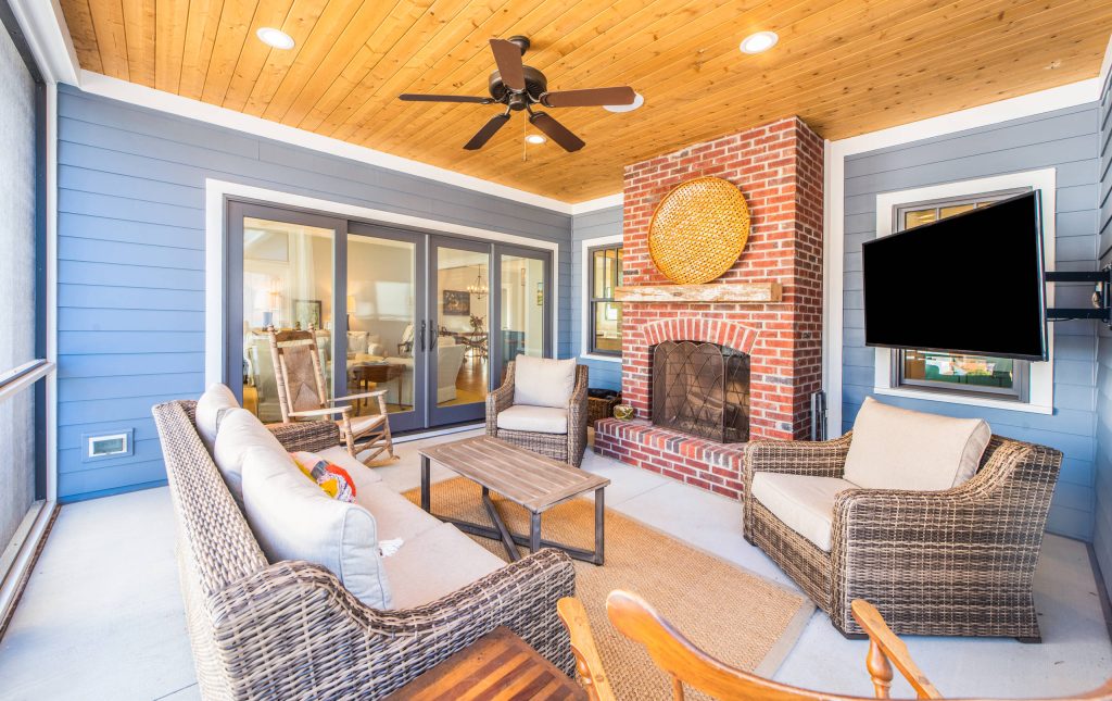 This is an example of a traditional concrete screened-in porch design in Other with a roof extension. by Tindall Architecture Workshop | Outdoor Photos | Porch | Landscaping | Landscape Design | Outdoor Living Space | Porch Design Ideas | Outdoor Living Space Ideas | Backyard Design