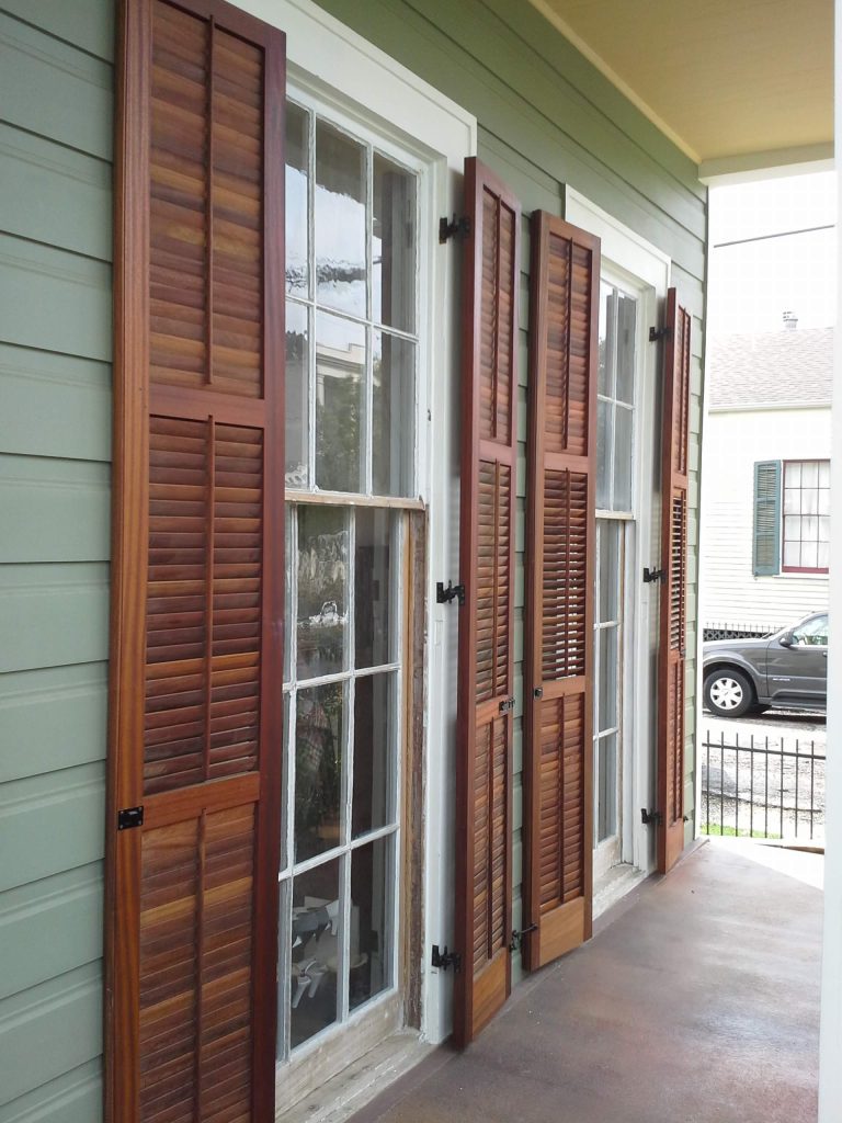 This is an example of a traditional front porch design in New Orleans. by Kestrel Shutters & Doors | Outdoor Photos | Porch | Landscaping | Landscape Design | Outdoor Living Space | Porch Design Ideas | Outdoor Living Space Ideas | Backyard Design