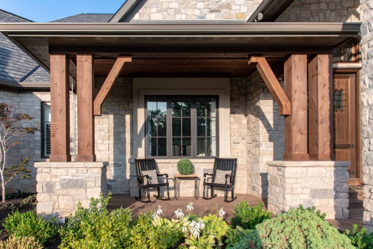 This is an example of a traditional front porch design in St Louis with a roof extension. by Liston Design Build | Outdoor Photos | Porch | Landscaping | Landscape Design | Outdoor Living Space | Porch Design Ideas | Outdoor Living Space Ideas | Backyard Design
