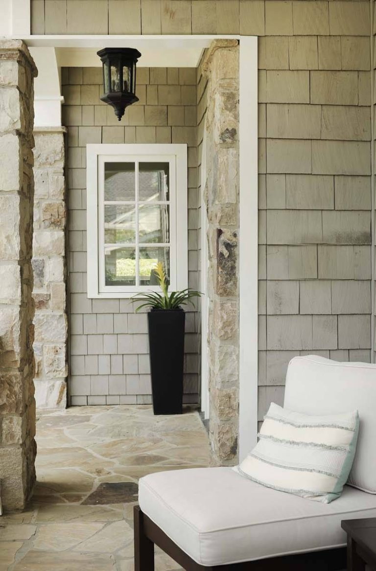 This is an example of a traditional porch design in Atlanta with a roof extension. by | Outdoor Photos | Porch | Landscaping | Landscape Design | Outdoor Living Space | Porch Design Ideas | Outdoor Living Space Ideas | Backyard Design