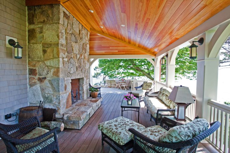 This is an example of a traditional porch design in Boston with a fire pit, decking and a roof extension. by Windover Construction | Outdoor Photos | Porch | Landscaping | Landscape Design | Outdoor Living Space | Porch Design Ideas | Outdoor Living Space Ideas | Backyard Design