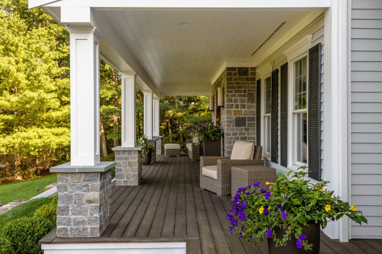 This is an example of a traditional porch design in Boston with decking and a roof extension. by Indresano Corp. | Outdoor Photos | Porch | Landscaping | Landscape Design | Outdoor Living Space | Porch Design Ideas | Outdoor Living Space Ideas | Backyard Design