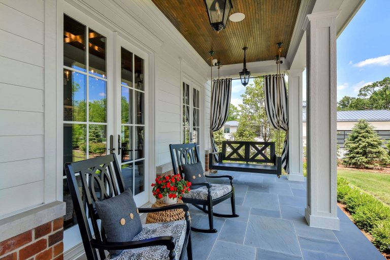 This is an example of a traditional porch design in Chicago with a roof extension. by Bertrand Landscape Design | Outdoor Photos | Porch | Landscaping | Landscape Design | Outdoor Living Space | Porch Design Ideas | Outdoor Living Space Ideas | Backyard Design