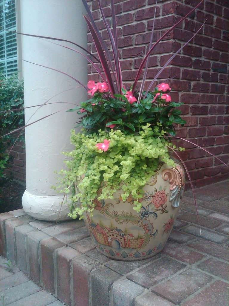 This is an example of a traditional porch design in Columbus. by At Home | Outdoor Photos | Porch | Landscaping | Landscape Design | Outdoor Living Space | Porch Design Ideas | Outdoor Living Space Ideas | Backyard Design