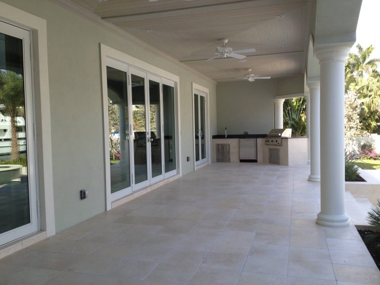 This is an example of a traditional porch design in Miami. by Royal Corinthian Homes | Outdoor Photos | Porch | Landscaping | Landscape Design | Outdoor Living Space | Porch Design Ideas | Outdoor Living Space Ideas | Backyard Design