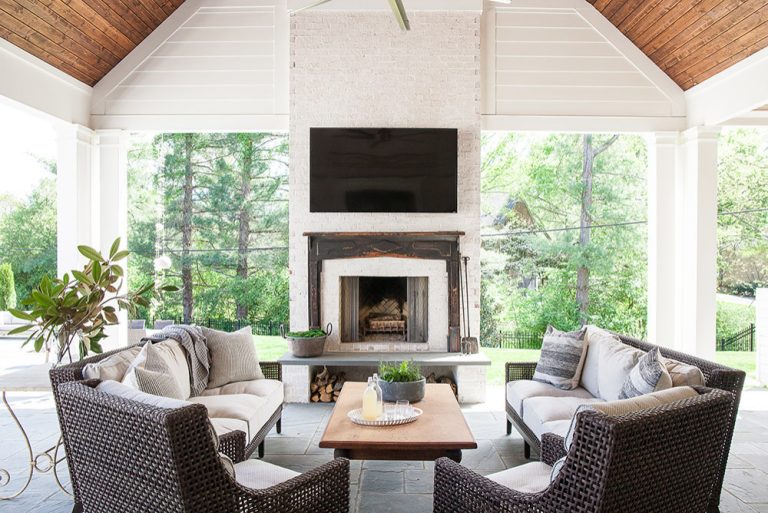 This is an example of a traditional porch design in Nashville with a fireplace and a roof extension. by Shapiro & Company Architects | Outdoor Photos | Porch | Landscaping | Landscape Design | Outdoor Living Space | Porch Design Ideas | Outdoor Living Space Ideas | Backyard Design