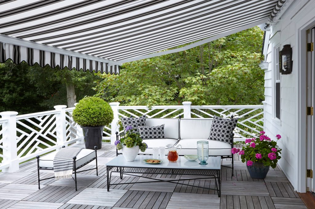 This is an example of a traditional porch design in New York with decking and an awning. by J Cohler Mason Design | Outdoor Photos | Porch | Landscaping | Landscape Design | Outdoor Living Space | Porch Design Ideas | Outdoor Living Space Ideas | Backyard Design
