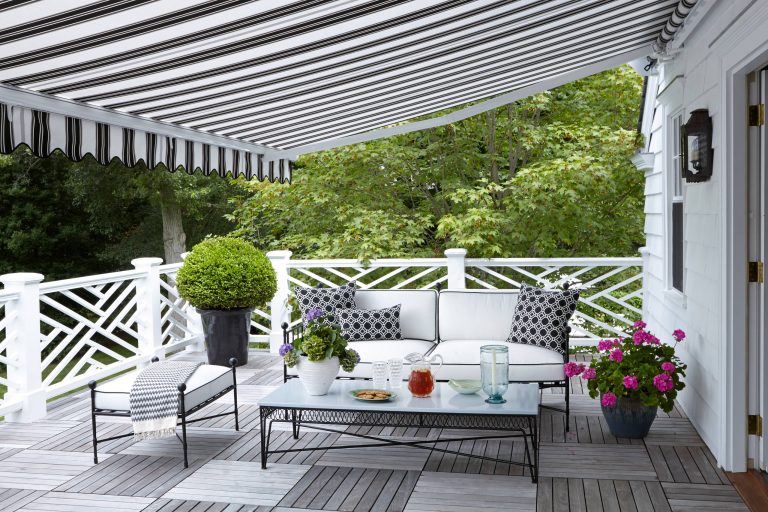 This is an example of a traditional porch design in New York with decking and an awning. by J Cohler Mason Design | Outdoor Photos | Porch | Landscaping | Landscape Design | Outdoor Living Space | Porch Design Ideas | Outdoor Living Space Ideas | Backyard Design