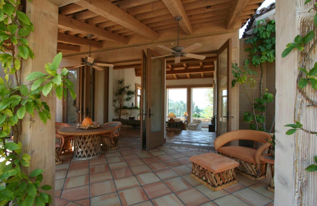 This is an example of a traditional porch design in San Diego with a roof extension. by Steigerwald-Dougherty, Inc. | Outdoor Photos | Porch | Landscaping | Landscape Design | Outdoor Living Space | Porch Design Ideas | Outdoor Living Space Ideas | Backyard Design