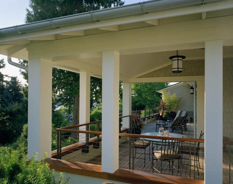 This is an example of a traditional porch design in Seattle with decking and a roof extension. by | Outdoor Photos | Porch | Landscaping | Landscape Design | Outdoor Living Space | Porch Design Ideas | Outdoor Living Space Ideas | Backyard Design