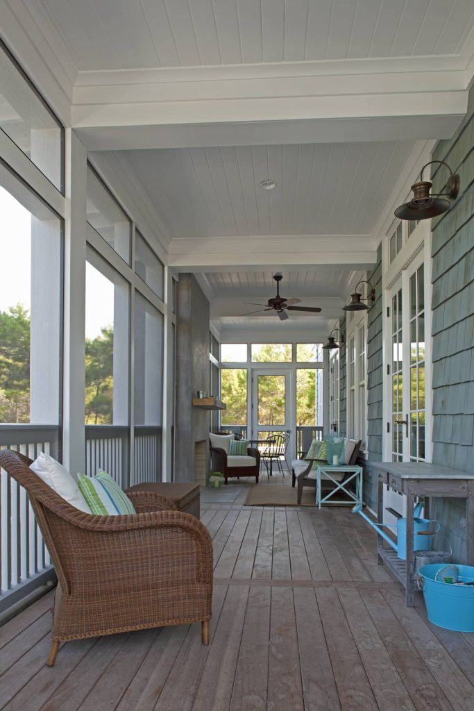 This is an example of a traditional screened-in porch design in Miami with decking and a roof extension. by | Outdoor Photos | Porch | Landscaping | Landscape Design | Outdoor Living Space | Porch Design Ideas | Outdoor Living Space Ideas | Backyard Design