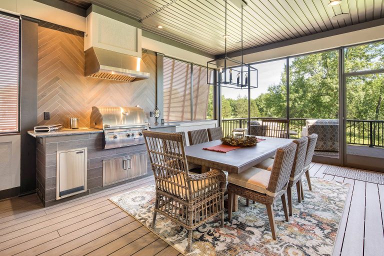 This is an example of a traditional screened-in porch design in St Louis with decking and a roof extension. by Stockell Custom Homes & Construction | Outdoor Photos | Porch | Landscaping | Landscape Design | Outdoor Living Space | Porch Design Ideas | Outdoor Living Space Ideas | Backyard Design