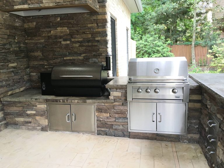 This is an example of a traditional stamped concrete porch design in Houston with a roof extension. by Billy Parker Exteriors | Outdoor Photos | Porch | Landscaping | Landscape Design | Outdoor Living Space | Porch Design Ideas | Outdoor Living Space Ideas | Backyard Design