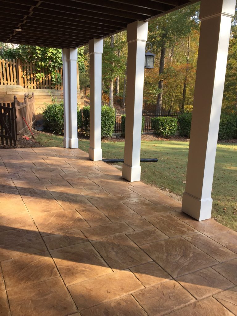 This is an example of a traditional stamped concrete screened-in porch design in Atlanta. by The Spiva Group | Outdoor Photos | Porch | Landscaping | Landscape Design | Outdoor Living Space | Porch Design Ideas | Outdoor Living Space Ideas | Backyard Design