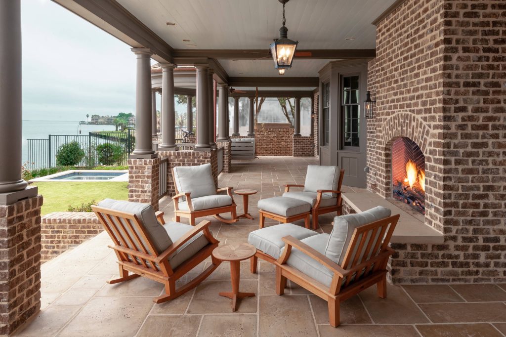 This is an example of a traditional tile back porch design in Houston with a roof extension. by Hill Swift Architect, pllc | Outdoor Photos | Porch | Landscaping | Landscape Design | Outdoor Living Space | Porch Design Ideas | Outdoor Living Space Ideas | Backyard Design