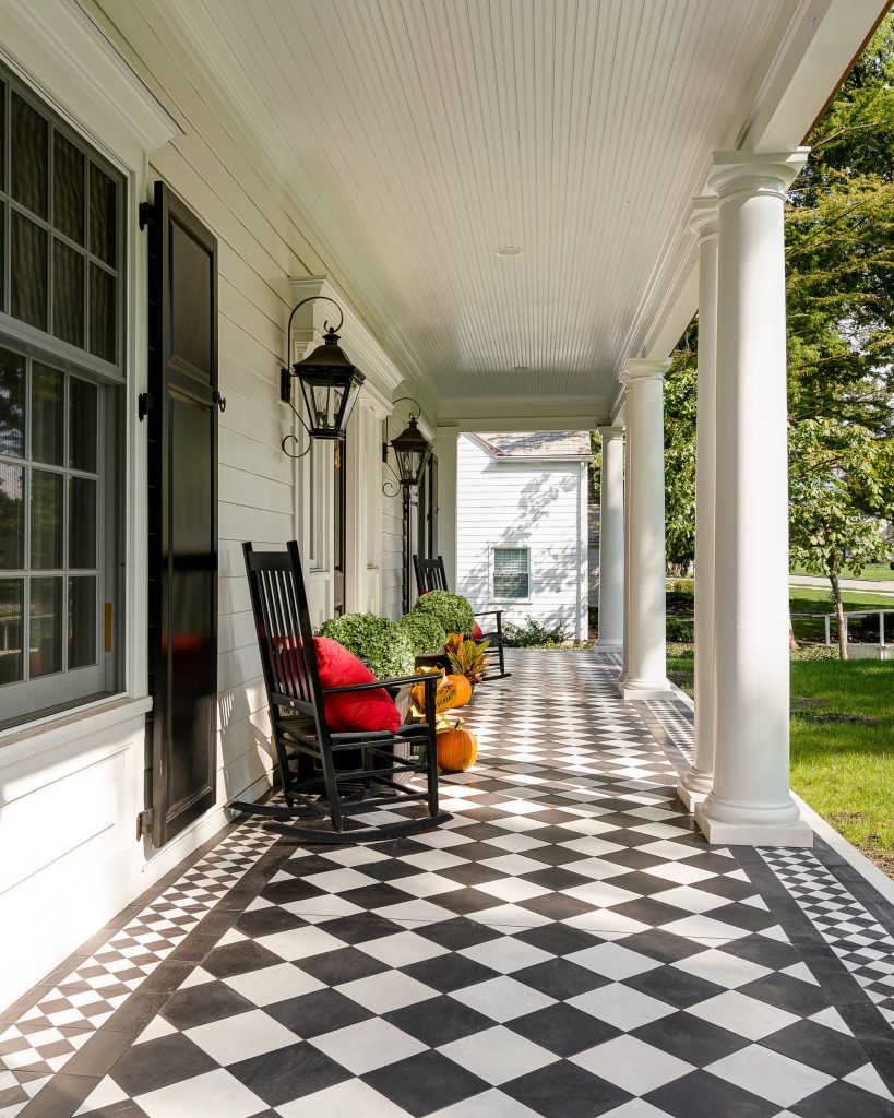 This is an example of a traditional tile porch design in Columbus with a roof extension. by Hope Restoration & General Contracting | Outdoor Photos | Porch | Landscaping | Landscape Design | Outdoor Living Space | Porch Design Ideas | Outdoor Living Space Ideas | Backyard Design