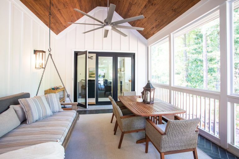 This is an example of a transitional porch design in Atlanta. by Coastal Signature Homes | Outdoor Photos | Porch | Landscaping | Landscape Design | Outdoor Living Space | Porch Design Ideas | Outdoor Living Space Ideas | Backyard Design