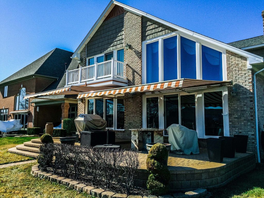 This is an example of a transitional porch design in Detroit. by Marygrove Awnings | Outdoor Photos | Porch | Landscaping | Landscape Design | Outdoor Living Space | Porch Design Ideas | Outdoor Living Space Ideas | Backyard Design