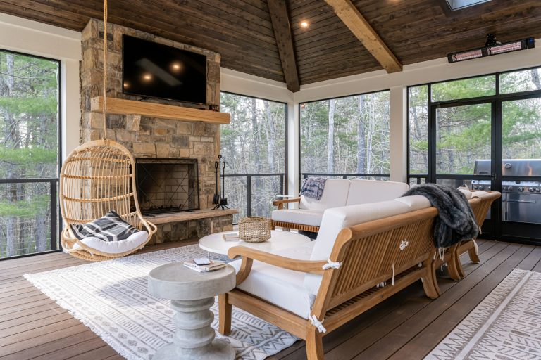 This is an example of a transitional porch design in Other. by Jackson Interiors | Outdoor Photos | Porch | Landscaping | Landscape Design | Outdoor Living Space | Porch Design Ideas | Outdoor Living Space Ideas | Backyard Design