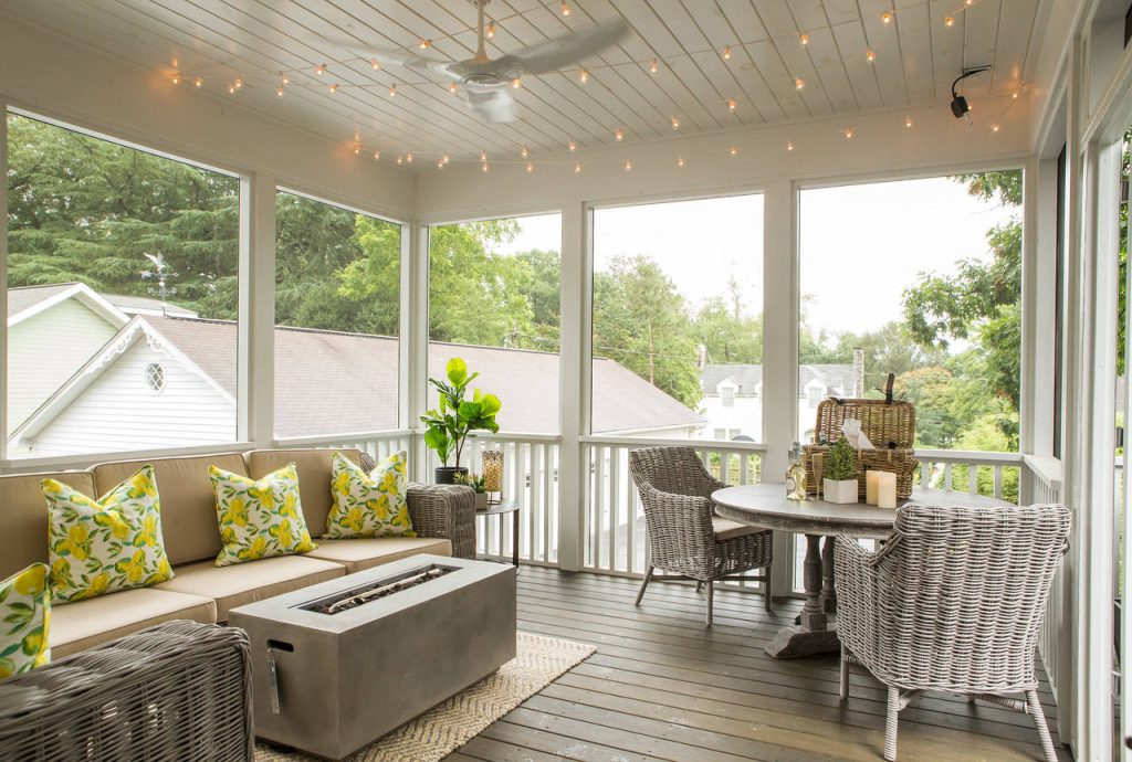 This is an example of a transitional screened-in porch design in Charlotte with decking and a roof extension. by User | Outdoor Photos | Porch | Landscaping | Landscape Design | Outdoor Living Space | Porch Design Ideas | Outdoor Living Space Ideas | Backyard Design