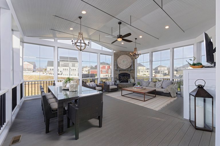 This is an example of a transitional screened-in side porch design in DC Metro with decking and a roof extension. by Metro Building and Remodeling Group LLC | Outdoor Photos | Porch | Landscaping | Landscape Design | Outdoor Living Space | Porch Design Ideas | Outdoor Living Space Ideas | Backyard Design