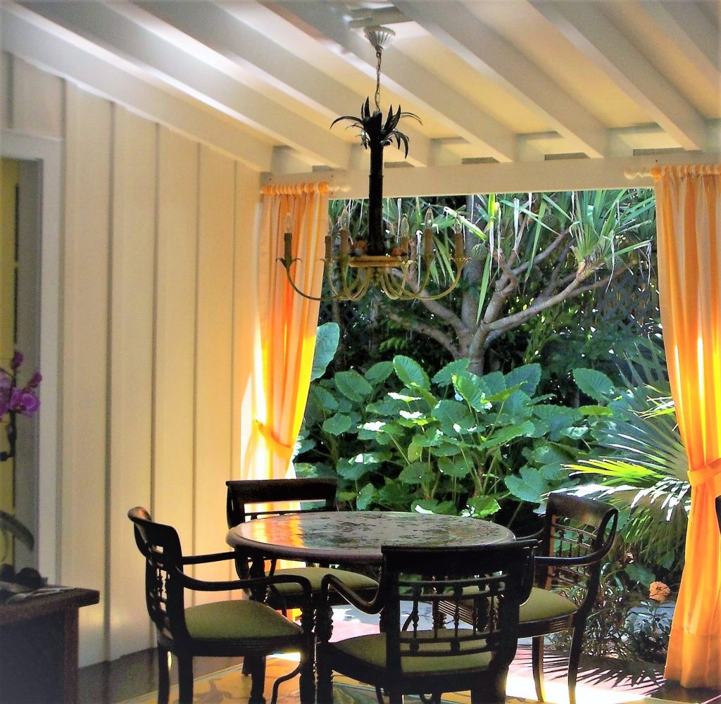 This is an example of a tropical porch design in Baltimore. by Peter Bartels, Interior Designer | Outdoor Photos | Porch | Landscaping | Landscape Design | Outdoor Living Space | Porch Design Ideas | Outdoor Living Space Ideas | Backyard Design