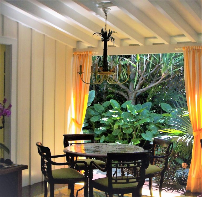 This is an example of a tropical porch design in Baltimore. by Peter Bartels, Interior Designer | Outdoor Photos | Porch | Landscaping | Landscape Design | Outdoor Living Space | Porch Design Ideas | Outdoor Living Space Ideas | Backyard Design