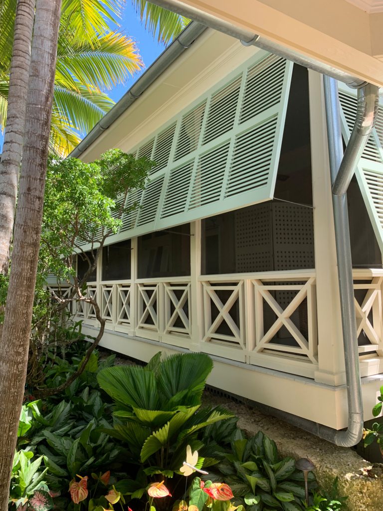 This is an example of a tropical porch design in Miami. by Paint Plus | Outdoor Photos | Porch | Landscaping | Landscape Design | Outdoor Living Space | Porch Design Ideas | Outdoor Living Space Ideas | Backyard Design