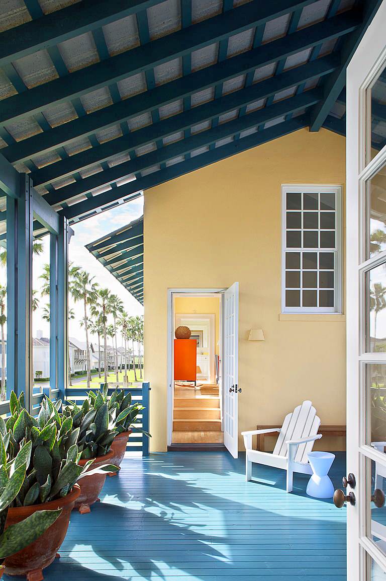 This is an example of a tropical porch design in Miami with decking and a roof extension. by Jorge Rosso Architecture/Interiors | Outdoor Photos | Porch | Landscaping | Landscape Design | Outdoor Living Space | Porch Design Ideas | Outdoor Living Space Ideas | Backyard Design