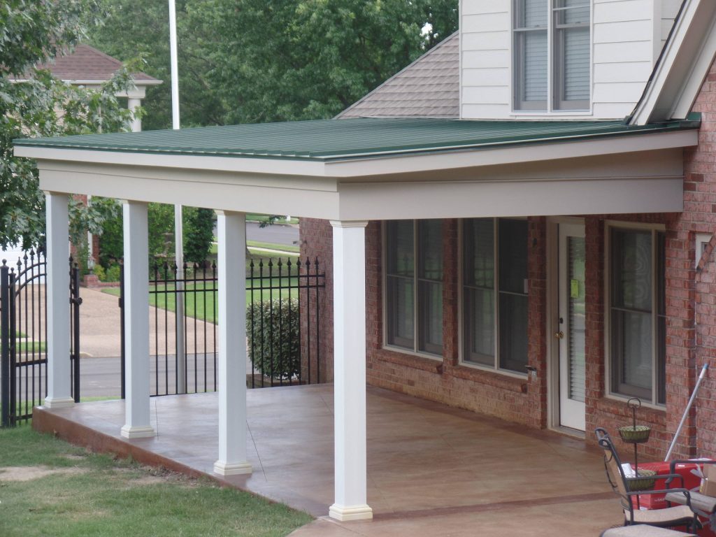 This is the 24 gauge self sealing metal roof for the new covered patio. New covered porch with square fiberglass columns.