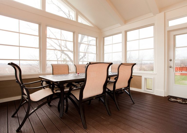 This large 3-season porch has enough room for many vignettes based on the needs of the family.