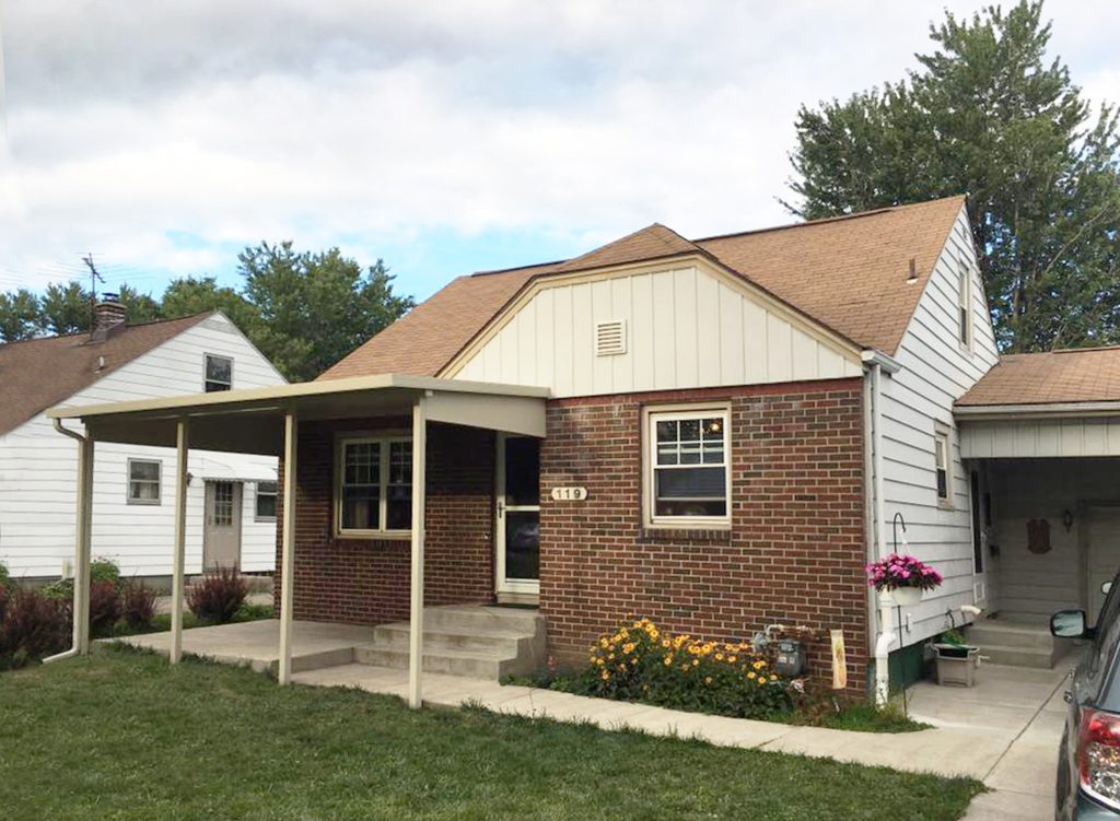 This patio cover protects the homeowners from rain and sun. They love spending time outdoors now!