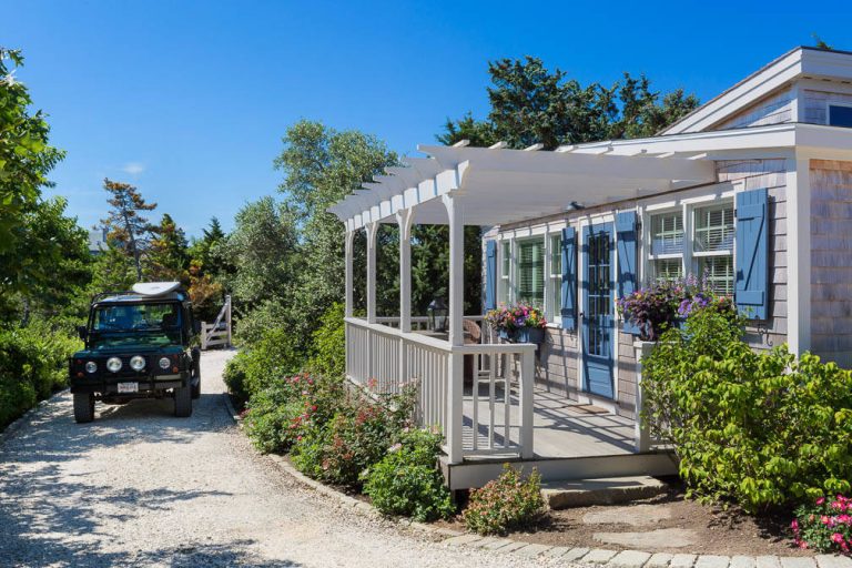 This quaint beach cottage is nestled on the coastal shores of Martha's Vineyard.