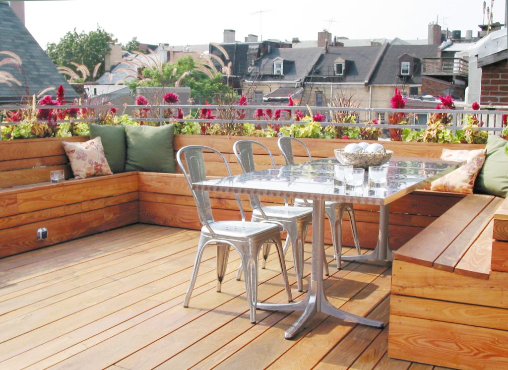 This roof deck has an abundance of seating for entertaining.