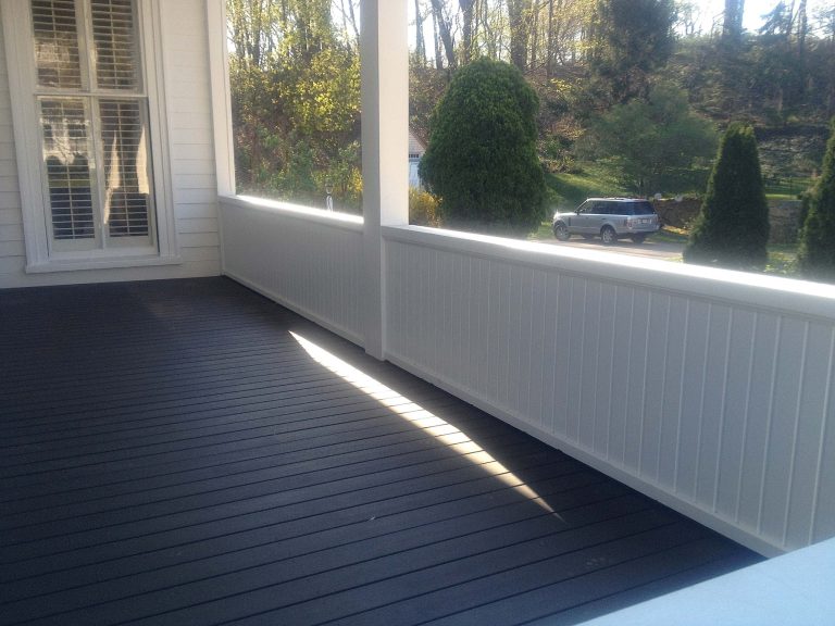 This side porch lower section was completely rebuilt with new side panels, lattice and a teak floor.