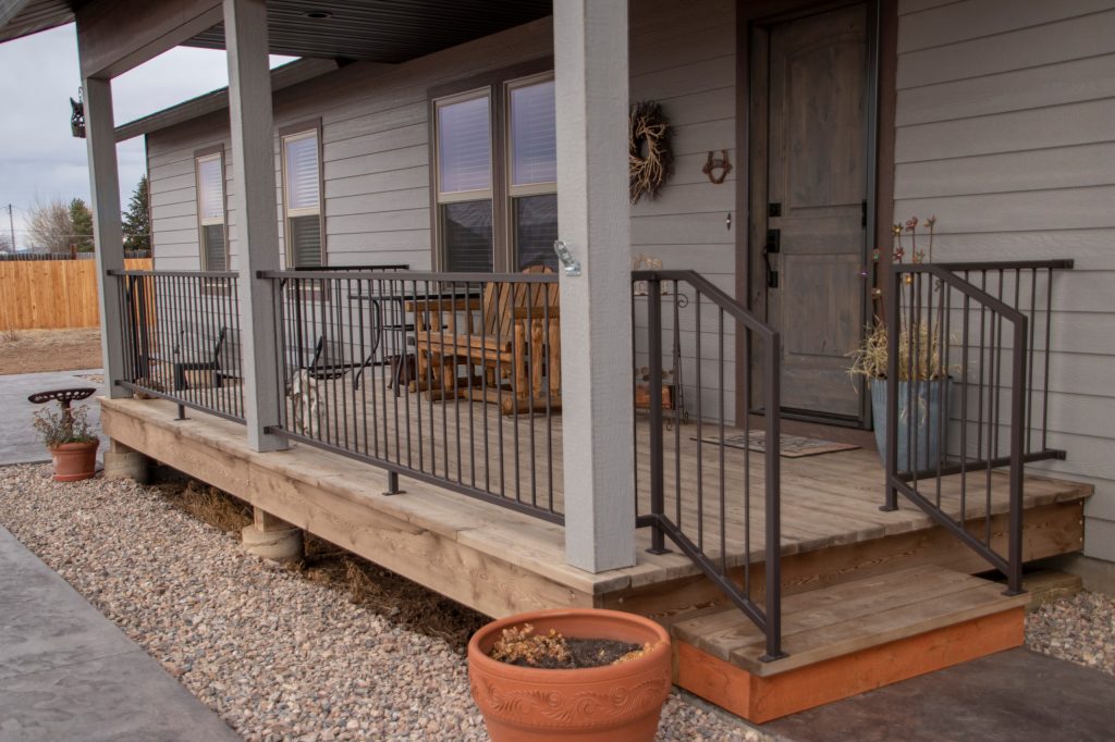 This simple yet functional deck rail was constructed out of tube steel and fabricated in the shop. It was installed in separate sections to complete the safety for this porch. by PC Industries Welding & Fabrication, PCI Metal | Outdoor Photos | Porch | Landscaping | Landscape Design | Outdoor Living Space | Porch Design Ideas | Outdoor Living Space Ideas | Backyard Design
