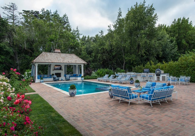 This space is great for parties. Guests are able to utilize the cabana, pool, outdoor seating area, lounge chairs, bar at the outdoor kitchen and outdoor dining.