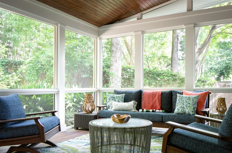This tranquil screened-in porch is the perfect spot to enjoy a book or catch up with friends.