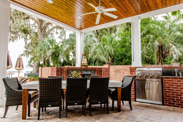This wonderful outdoor dining area features an all brick fireplace, stained tongue and groove ceiling and a beautiful view overlooking the St. Johns River.

Built by:
J.A. Long, Inc
Design Builders by J.A. Long, Inc | Outdoor Kitchens | Backyard Design | Outdoor Living Spaces | Landscape Design