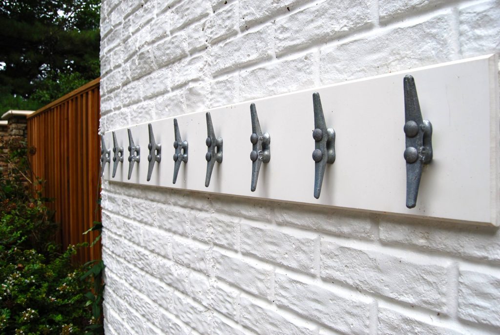 Towel hooks perfect for those big backyard pool parties! Design: Andrea Hickman of A.HICKMAN Design; Construction: Greg Deans of Decks with Style; Photography: Andrea Hickman