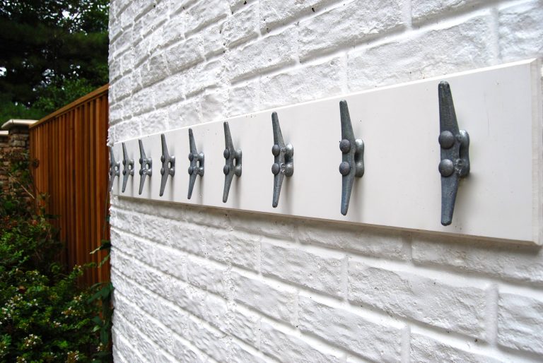 Towel hooks perfect for those big backyard pool parties! Design: Andrea Hickman of A.HICKMAN Design; Construction: Greg Deans of Decks with Style; Photography: Andrea Hickman