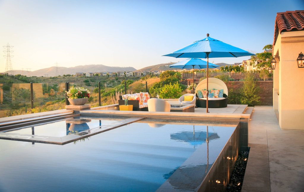 Transitional backyard rectangular aboveground pool fountain photo in San Diego