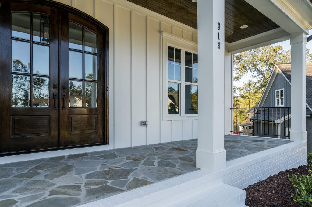 Transitional front porch photo in Raleigh by Poythress Construction Company Inc. | Outdoor Photos | Porch | Landscaping | Landscape Design | Outdoor Living Space | Porch Design Ideas | Outdoor Living Space Ideas | Backyard Design