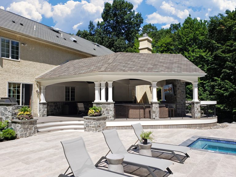 Transitional metal railing back porch photo in Other with a fireplace by Keystone Custom Decks | Outdoor Photos | Porch | Landscaping | Landscape Design | Outdoor Living Space | Porch Design Ideas | Outdoor Living Space Ideas | Backyard Design