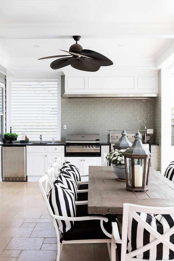 Transitional patio kitchen photo in Brisbane