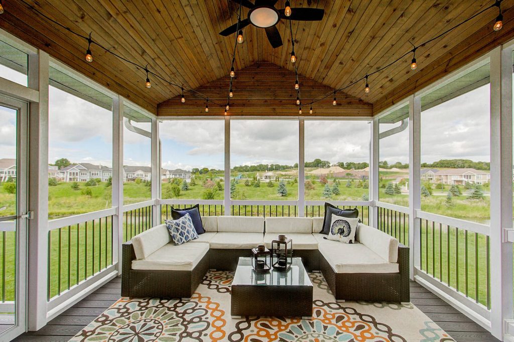 Transitional screened-in porch photo in Other with decking by Premier Builders, Inc. | Outdoor Photos | Porch | Landscaping | Landscape Design | Outdoor Living Space | Porch Design Ideas | Outdoor Living Space Ideas | Backyard Design