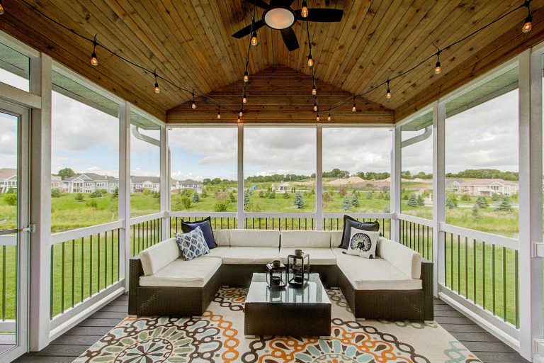 Transitional screened-in porch photo in Other with decking by Premier Builders, Inc. | Outdoor Photos | Porch | Landscaping | Landscape Design | Outdoor Living Space | Porch Design Ideas | Outdoor Living Space Ideas | Backyard Design