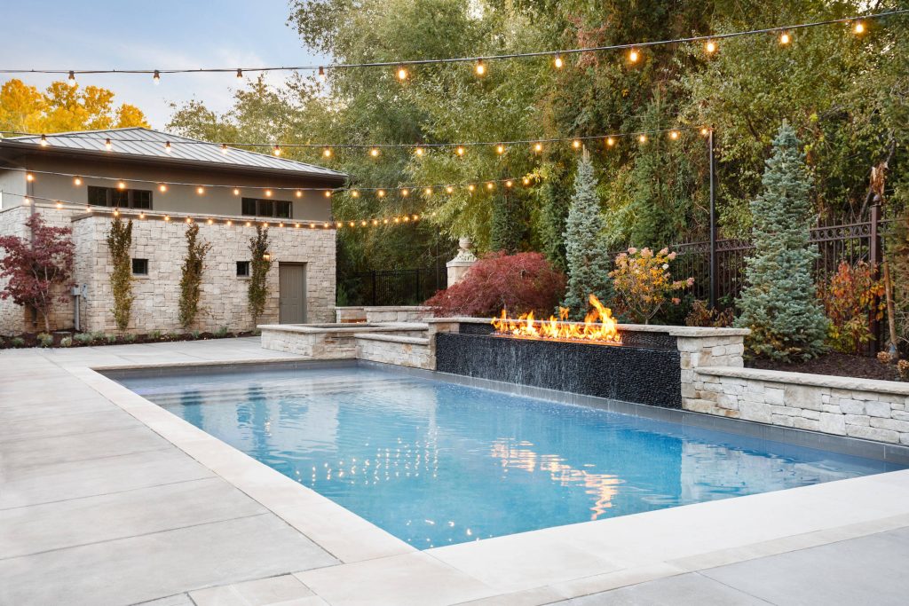 Trendy backyard concrete and rectangular hot tub photo in Salt Lake City