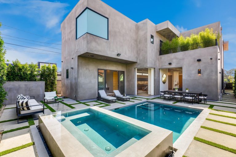 Trendy backyard concrete paver and rectangular hot tub photo in San Francisco