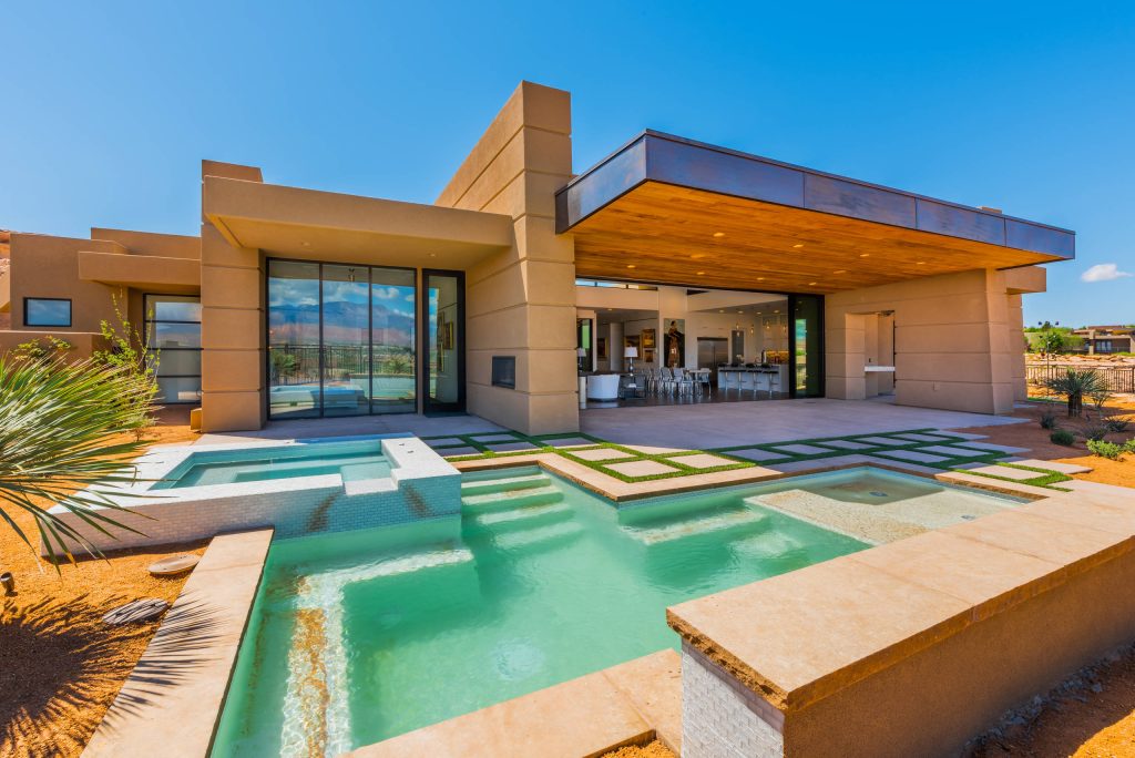 Trendy backyard tile and custom-shaped lap hot tub photo in Salt Lake City